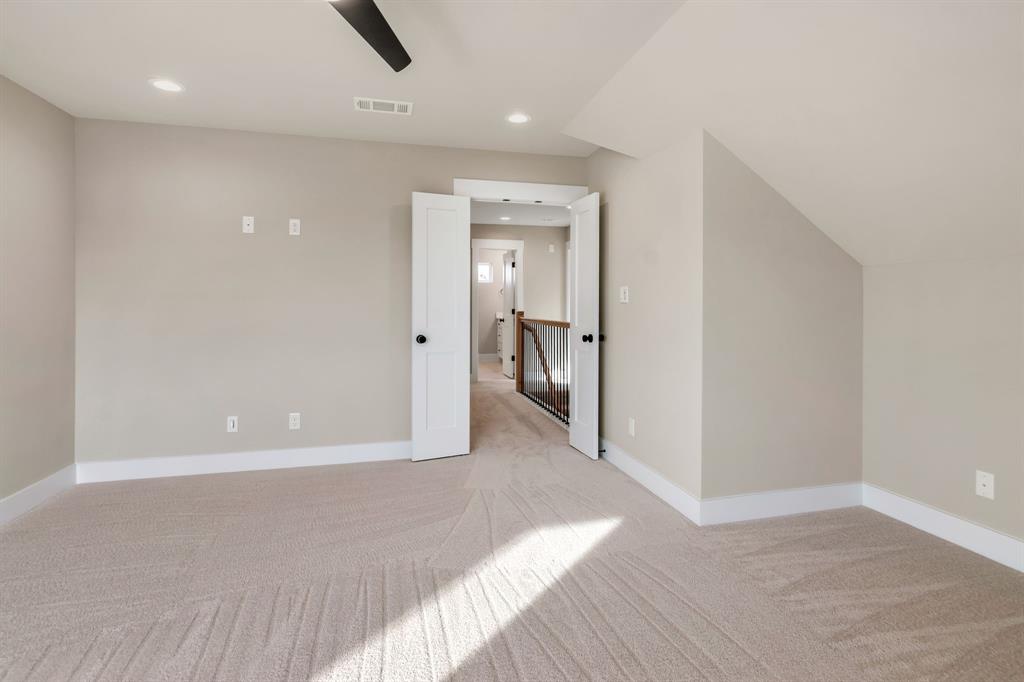 207 West 7th Street Justin, TX 76247 - Photo 29 of 40 a view of a hallway with wooden floor and closet