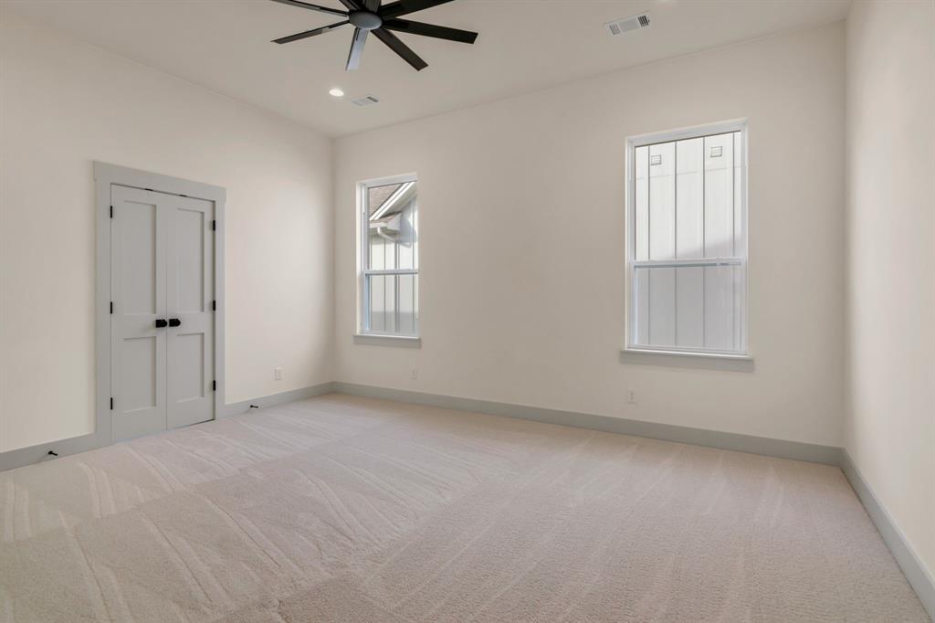 207 West 7th Street Justin, TX 76247 - Photo 35 of 40 a view of an empty room with a window