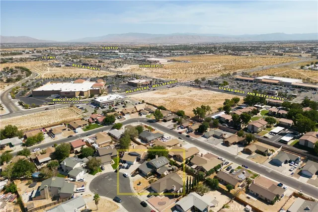 an aerial view of residential building and ocean