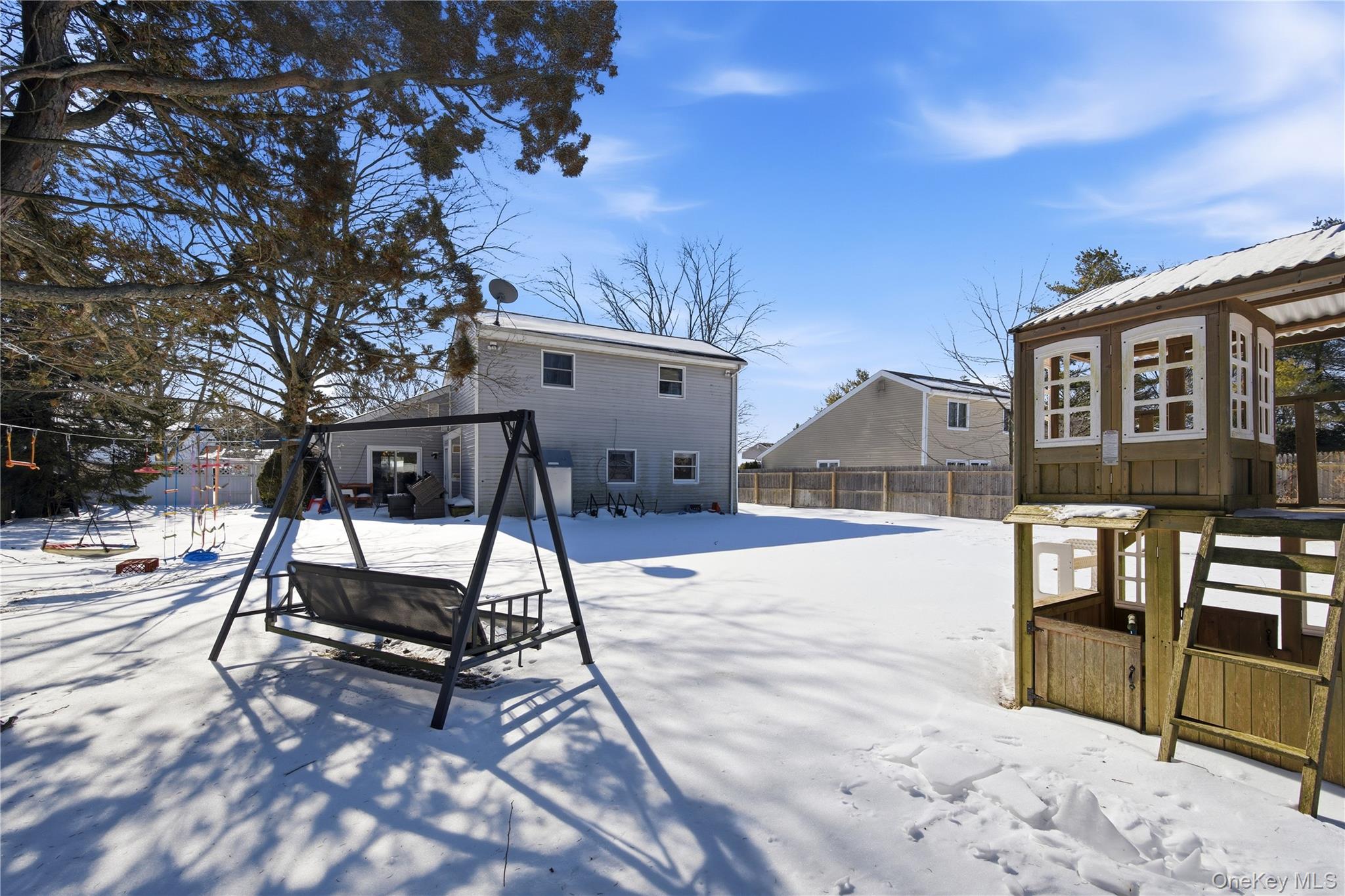 50 Rustic Avenue Medford, NY 11763 - Photo 15 of 20 a house view with a backyard space