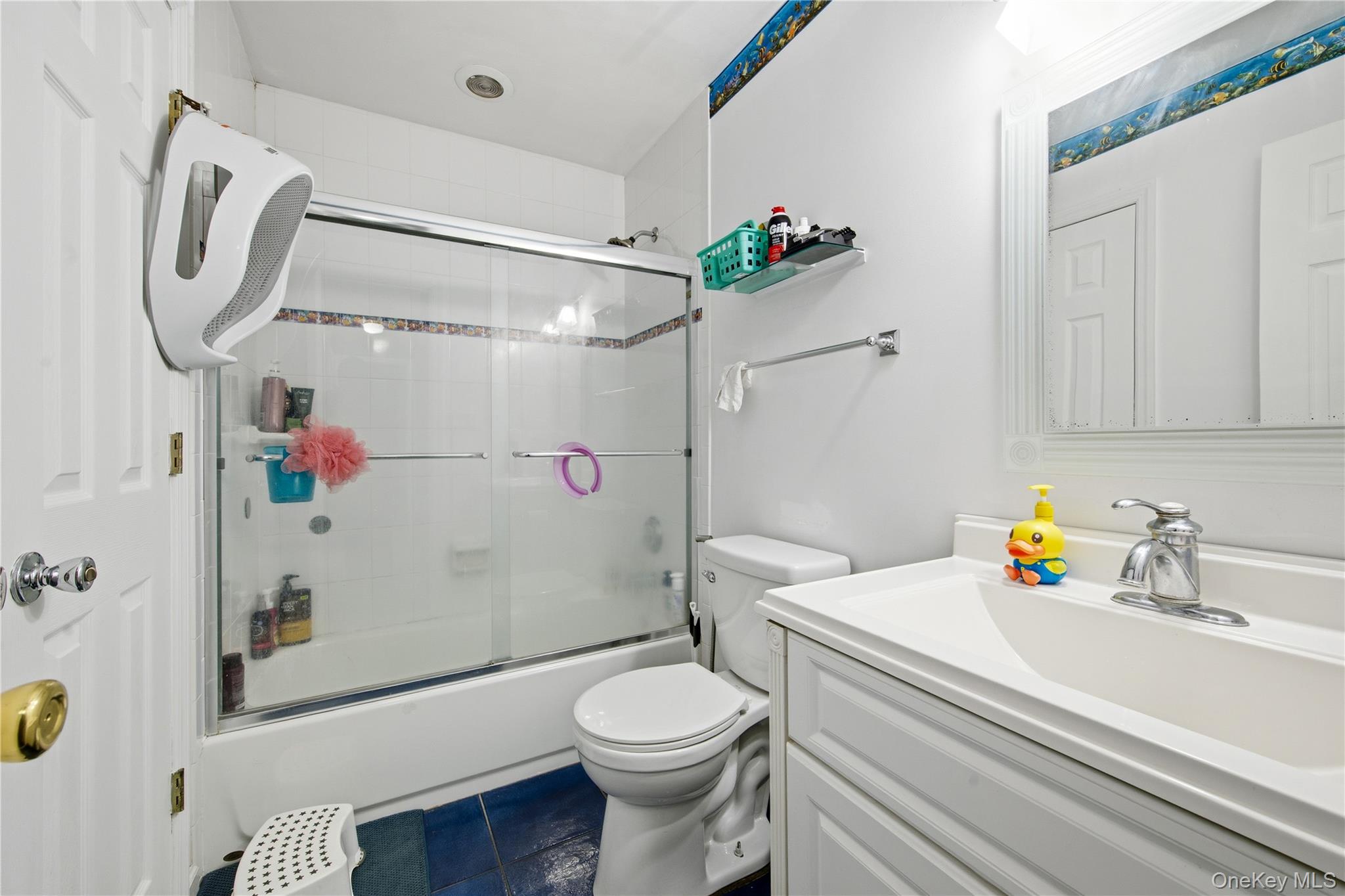 50 Rustic Avenue Medford, NY 11763 - Photo 10 of 20 a bathroom with a sink toilet and shower