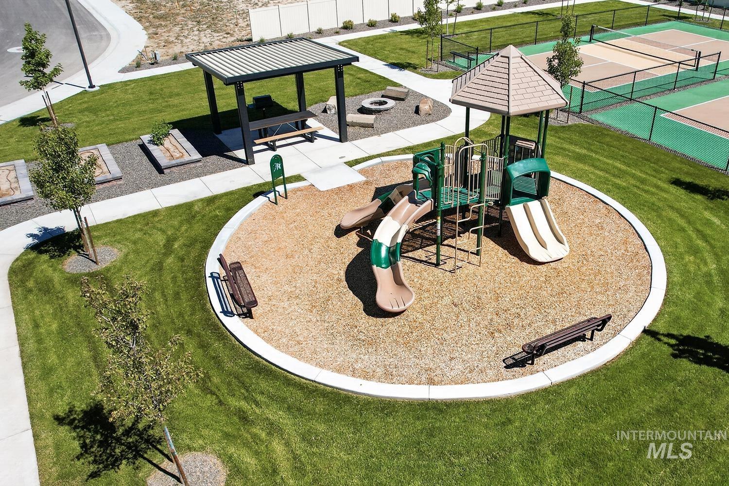 2702 Fall Line Street Caldwell, ID 83605 - Photo 22 of 26 Community Park with Half Basketball Court, Pickleball Court, Tot-Lot, Raised Garden Beds, Covered Picnic Area with BBQ Station and Fire Pit