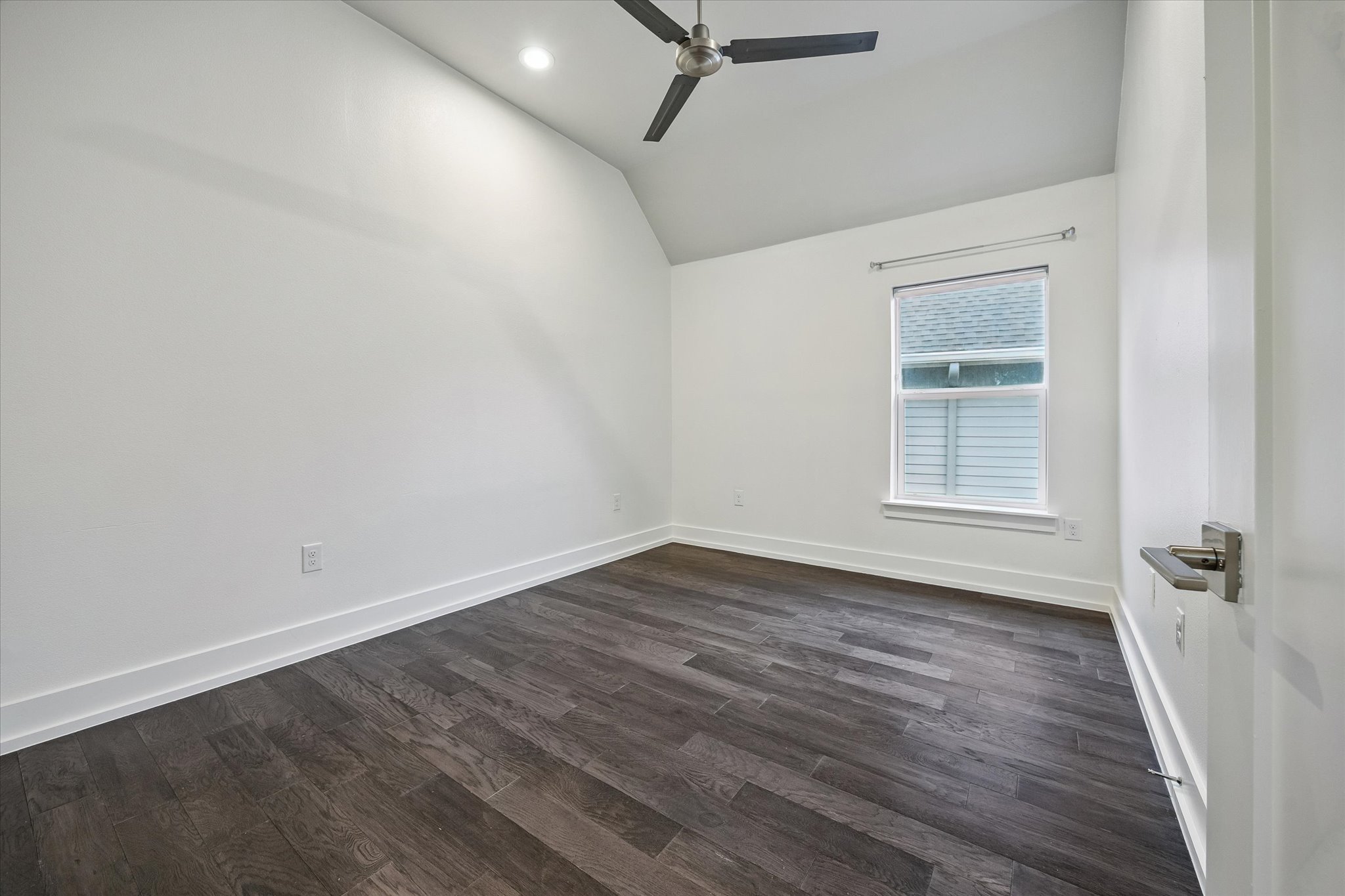 1224 Eleanor Street, Unit 1 Austin, TX 78721 - Photo 15 of 18 wooden floor in an empty room with a window
