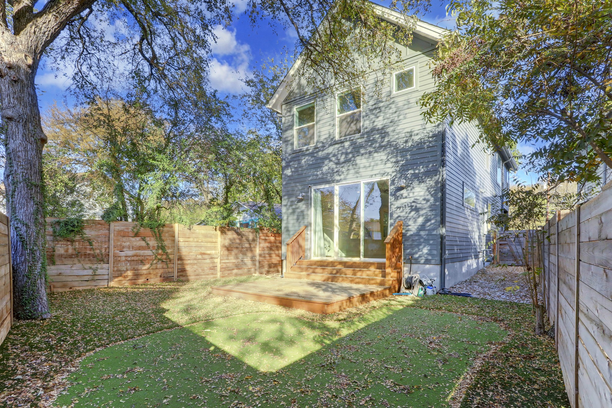 1224 Eleanor Street, Unit 1 Austin, TX 78721 - Photo 17 of 18 a view of a building with a yard