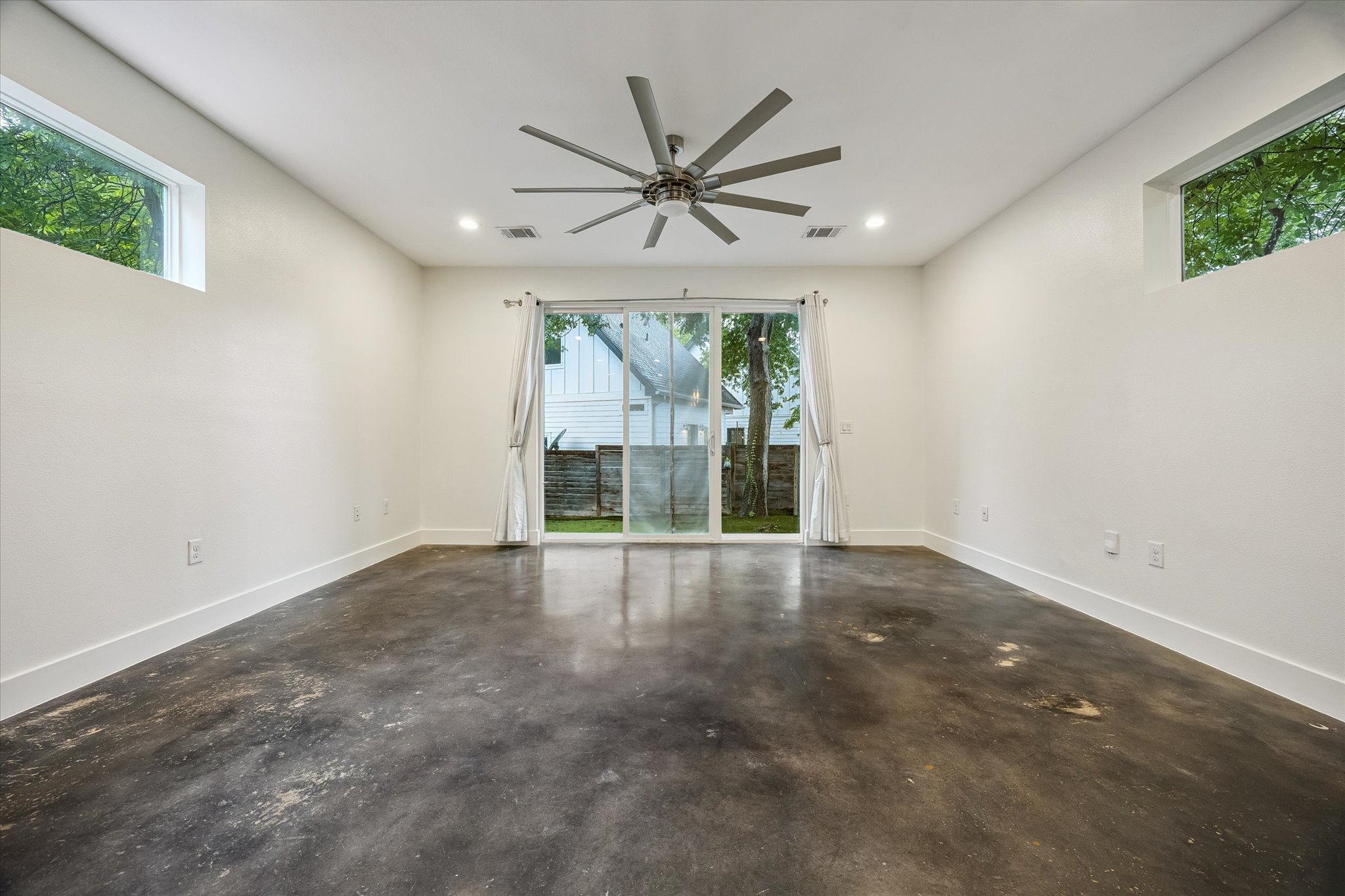 1224 Eleanor Street, Unit 1 Austin, TX 78721 - Photo 7 of 18 a view of an empty room with a window