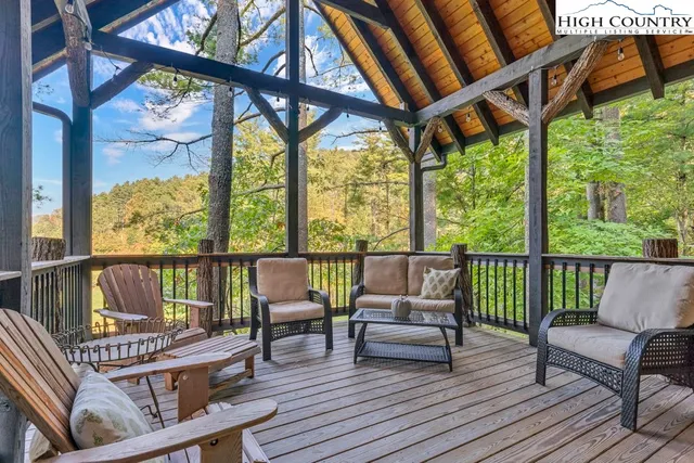 a view of a chairs and table in the patio