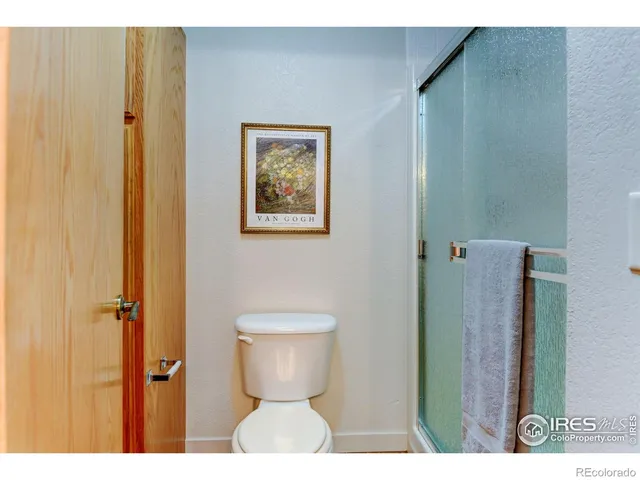 a picture of a cabinet with a white wall