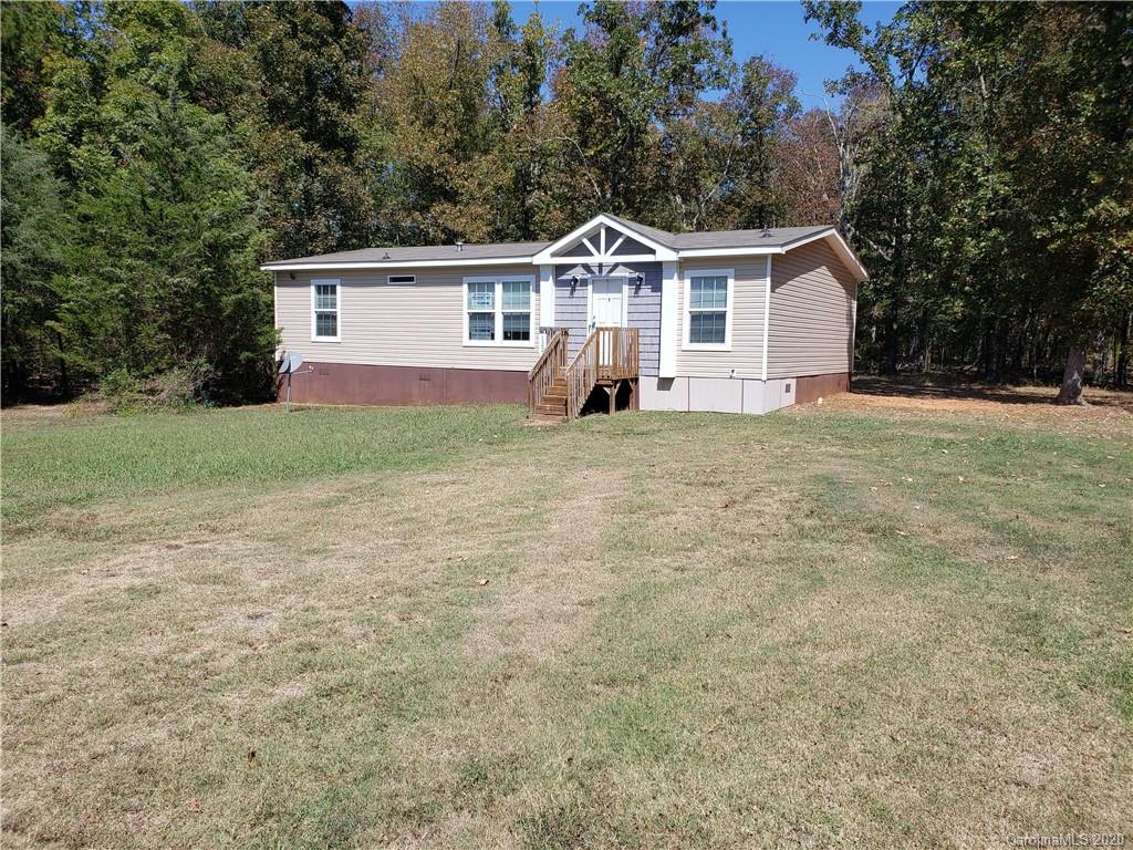 1224 Daniel Road, Unit A York, SC 29745 - Photo 1 of 33 a view of a yard in front of a house with large trees