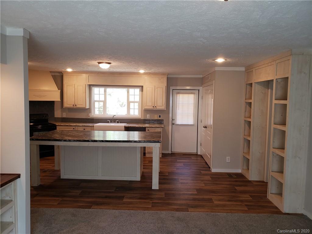 1224 Daniel Road, Unit A York, SC 29745 - Photo 14 of 33 a view of kitchen with wooden floor and electronic appliances