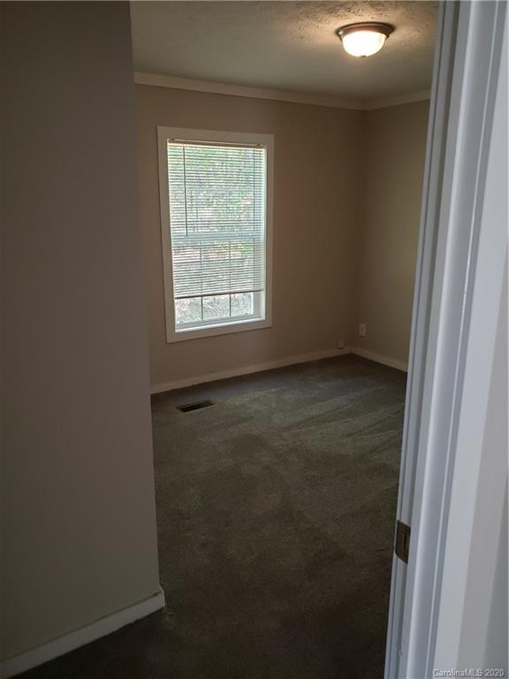 1224 Daniel Road, Unit A York, SC 29745 - Photo 31 of 33 an empty room with a window