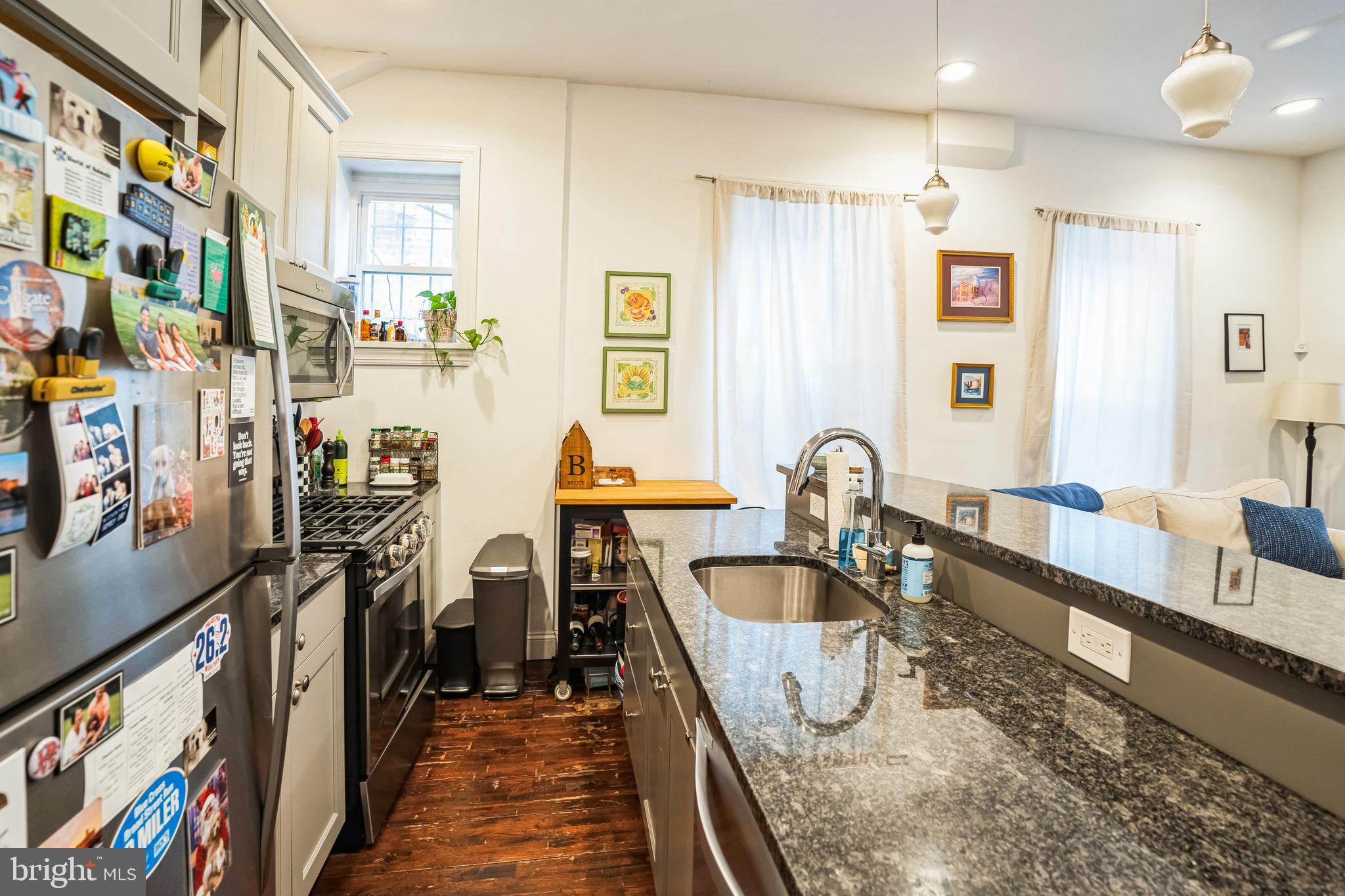 2124 Spruce Street, Unit 1R Philadelphia, PA 19103 - Photo 2 of 17 a view of a kitchen with furniture and a window