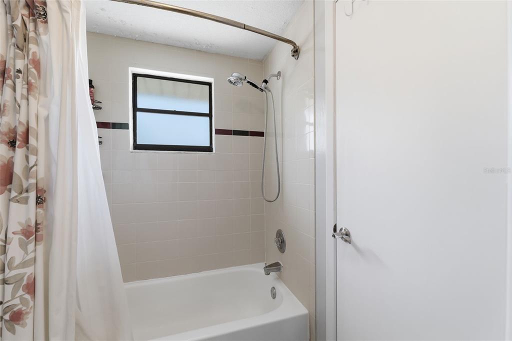 12935 Rain Forest Street Temple Terrace, FL 33617 - Photo 27 of 51 a bathroom with a bathtub