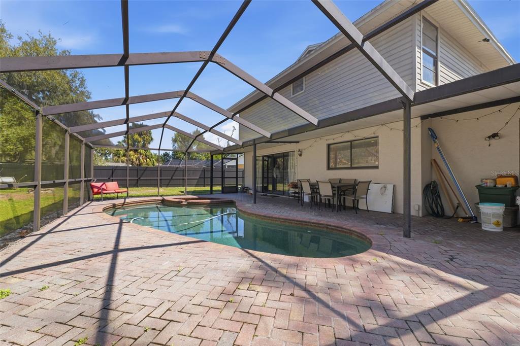 12935 Rain Forest Street Temple Terrace, FL 33617 - Photo 36 of 51 a view of a backyard with sitting area