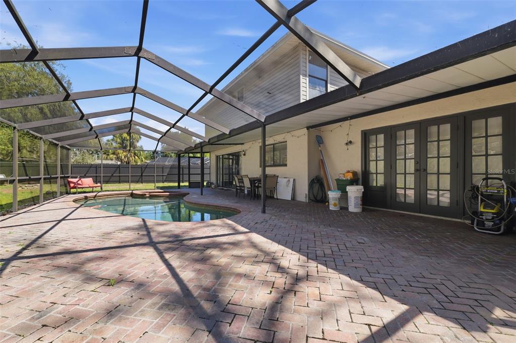 12935 Rain Forest Street Temple Terrace, FL 33617 - Photo 37 of 51 a view of a backyard with porch