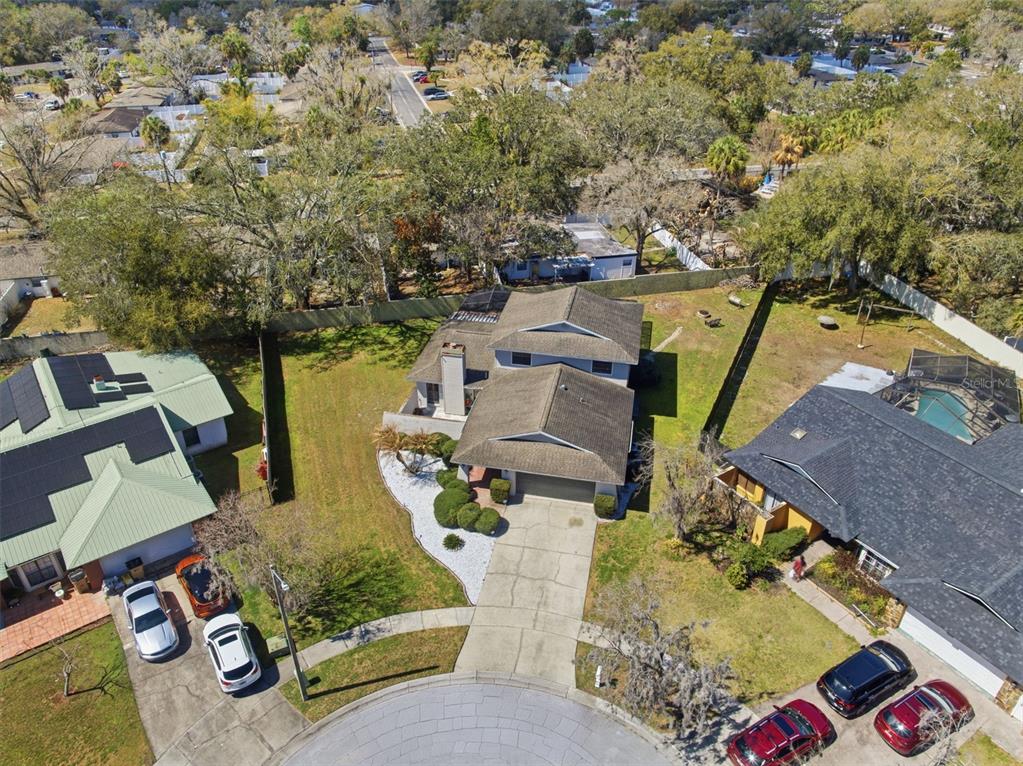 12935 Rain Forest Street Temple Terrace, FL 33617 - Photo 45 of 51 an aerial view of a house with a swimming pool