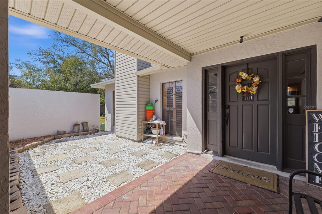 12935 Rain Forest Street Temple Terrace, FL 33617 - Photo 6 of 51 a bedroom with a bed and a large mirror on the wall