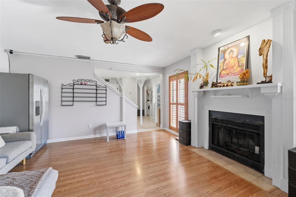 12935 Rain Forest Street Temple Terrace, FL 33617 - Photo 10 of 51 a living room with furniture and a fireplace