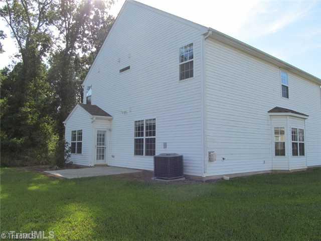 5274 Crosswinds Road McLeansville, NC 27301 - Photo 3 of 16 Exterior Front. Back View with Patio