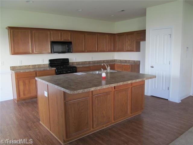 5274 Crosswinds Road McLeansville, NC 27301 - Photo 5 of 16 Exterior Front. WOW this is a Big Kitchen
