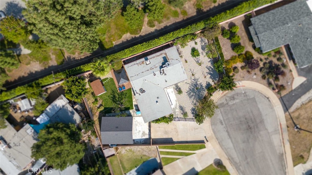 301 West Ashby Street Azusa, CA 91702 - Photo 7 of 75 an aerial view of a house with a yard and swimming pool