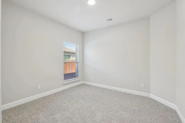 an empty room with window