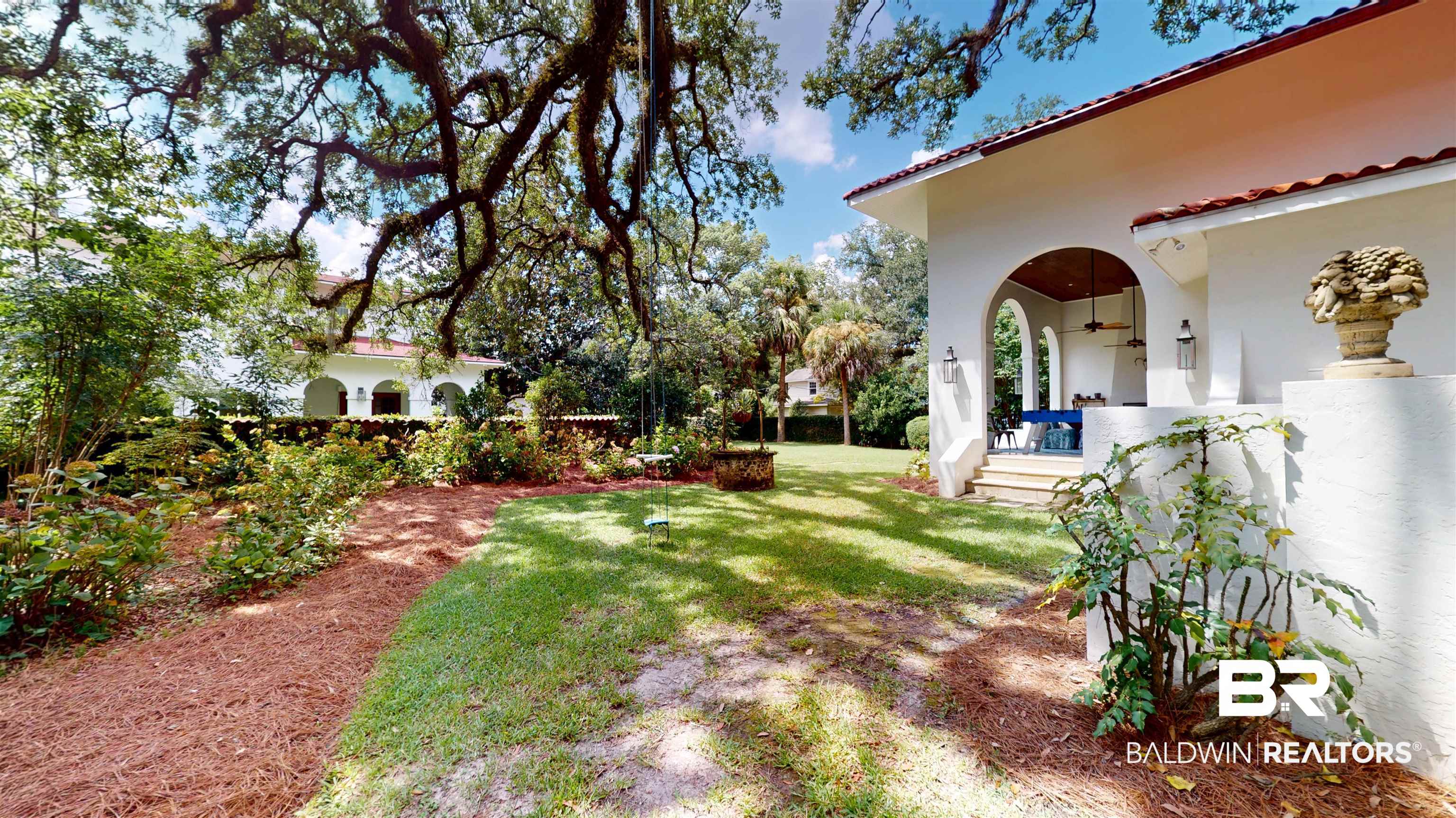 211 Lanier Avenue Mobile, AL 36607 - Photo 57 of 73 View of grassy yard with a ceiling fan
