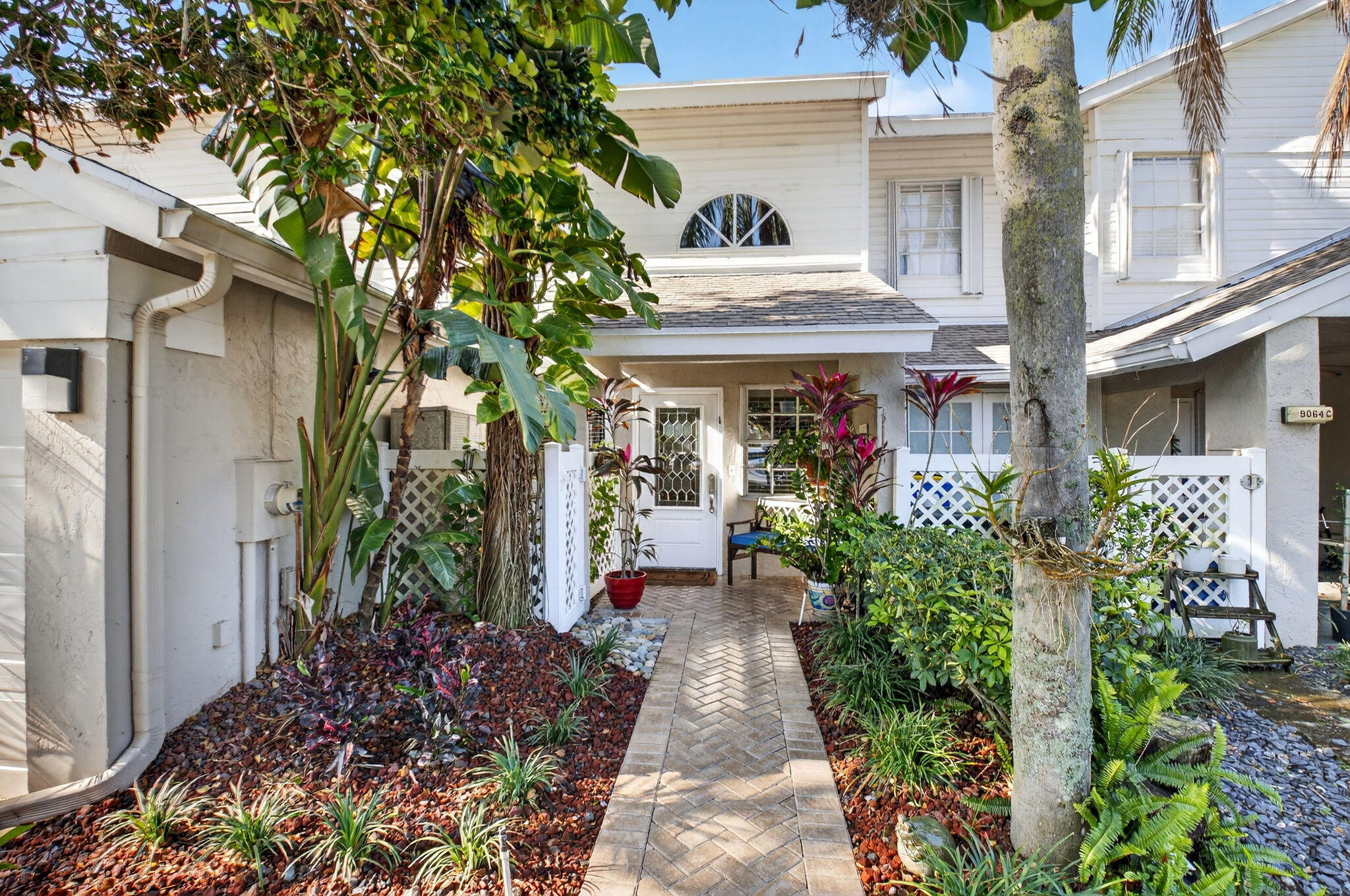 9064 Boca Gardens Parkway, Unit B Boca Raton, FL 33496 - Photo 1 of 41 a view of house with an outdoor space