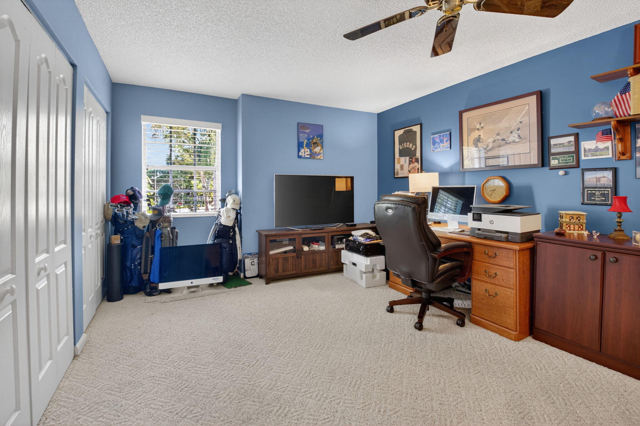 9064 Boca Gardens Parkway, Unit B Boca Raton, FL 33496 - Photo 28 of 41 a view of a livingroom with workspace and a window