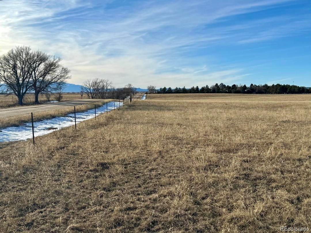 9540 North Log Road Calhan, CO 80808 - Photo 9 of 11 a view of lake with outdoor space