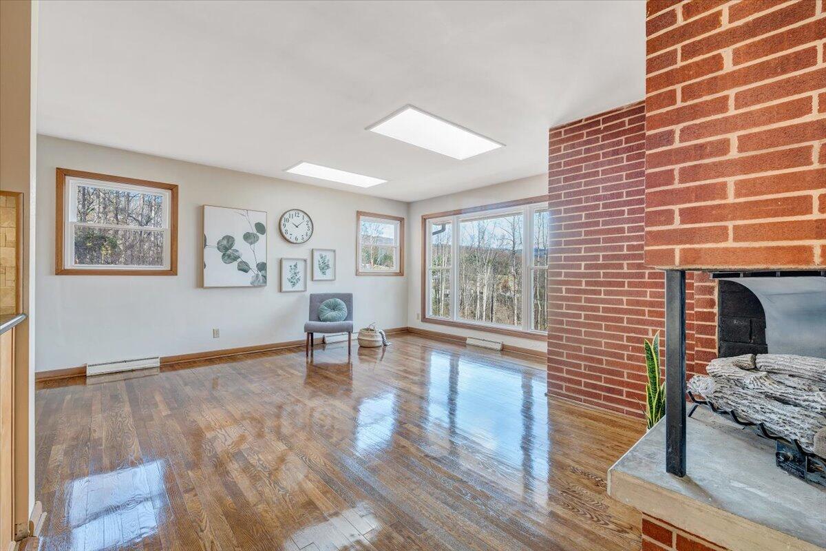 4151 Givens Road Salem, VA 24153 - Photo 11 of 45 a living room with furniture and a table