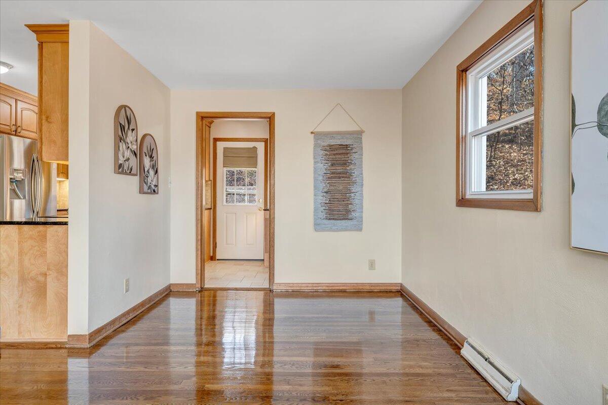 4151 Givens Road Salem, VA 24153 - Photo 12 of 45 a view of an empty room with wooden floor and a window