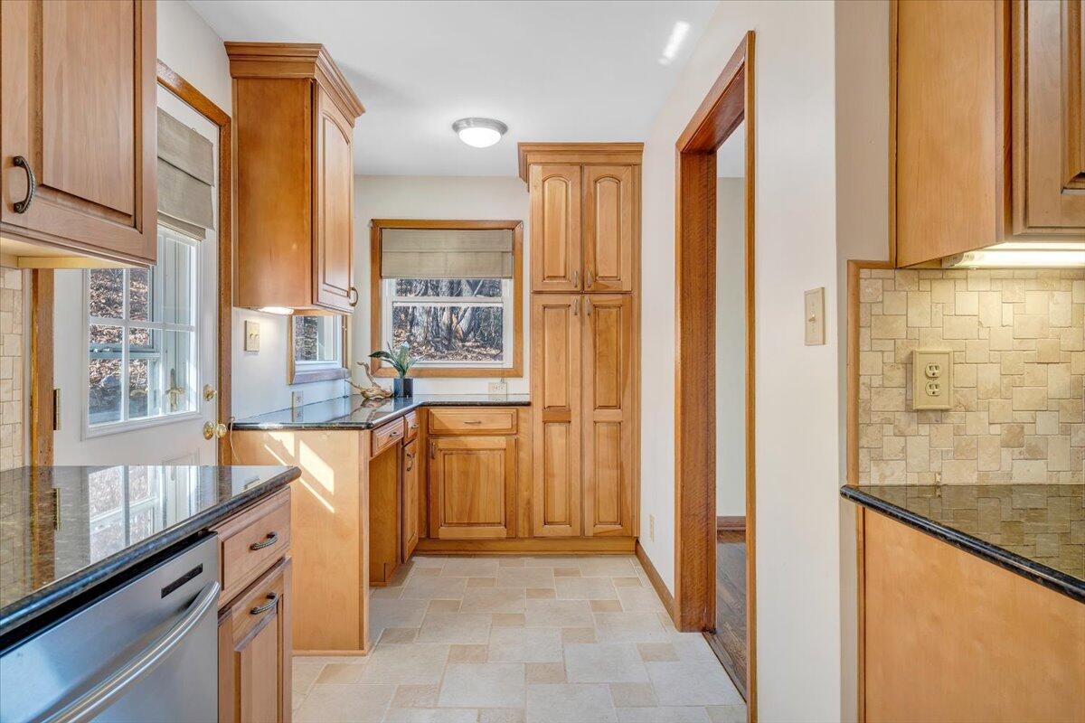 4151 Givens Road Salem, VA 24153 - Photo 16 of 45 a view of a kitchen with a sink and a large window