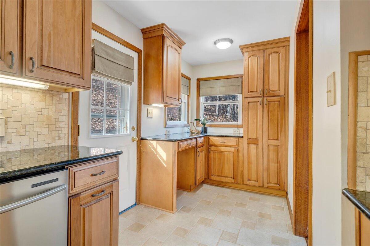 4151 Givens Road Salem, VA 24153 - Photo 17 of 45 a kitchen with stainless steel appliances granite countertop a refrigerator and a sink
