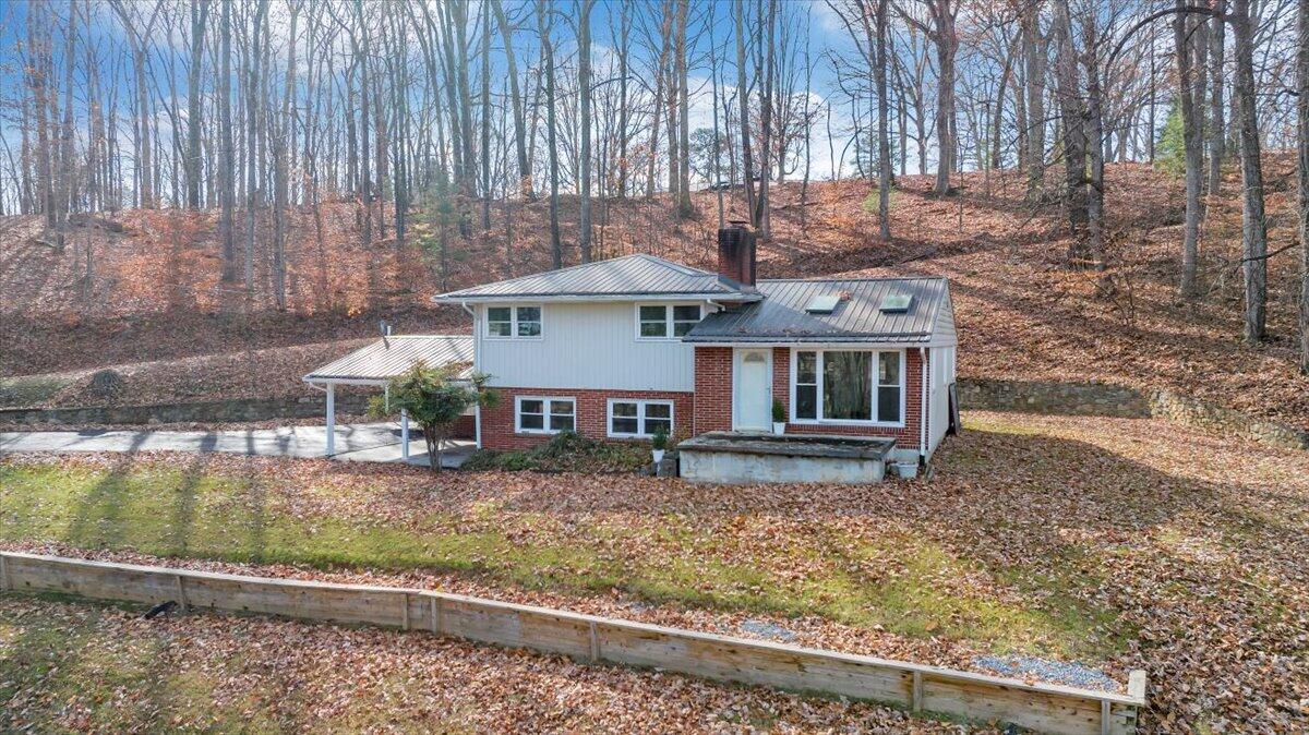 4151 Givens Road Salem, VA 24153 - Photo 3 of 45 a view of a house with a yard