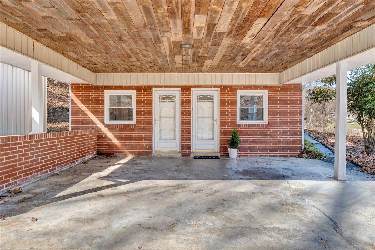 4151 Givens Road Salem, VA 24153 - Photo 36 of 45 a view of a house with backyard and parking area