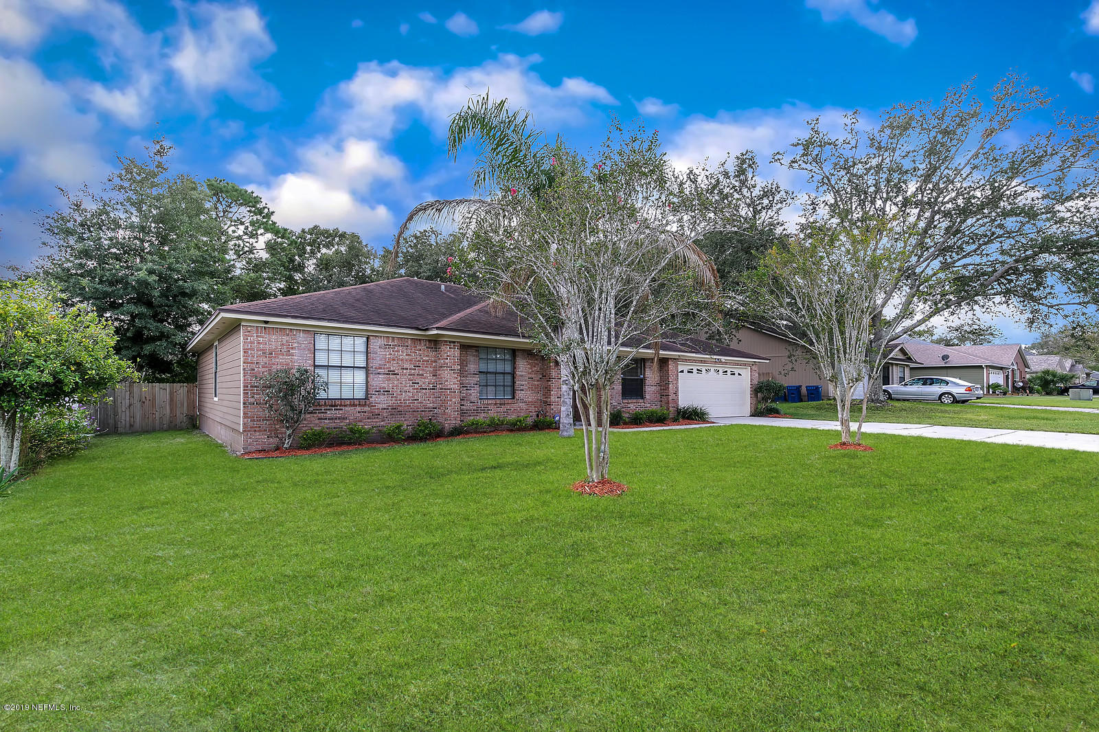 12436 Running River Road South Jacksonville, FL 32225 - Photo 21 of 25 a view of a house with a big yard
