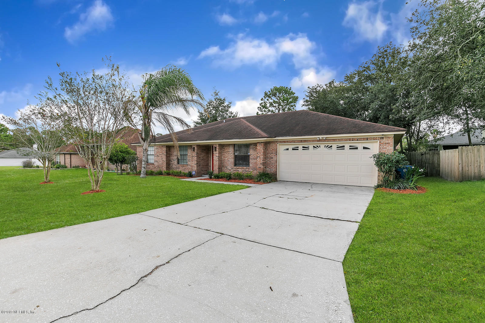 12436 Running River Road South Jacksonville, FL 32225 - Photo 22 of 25 front view of a house with a yard
