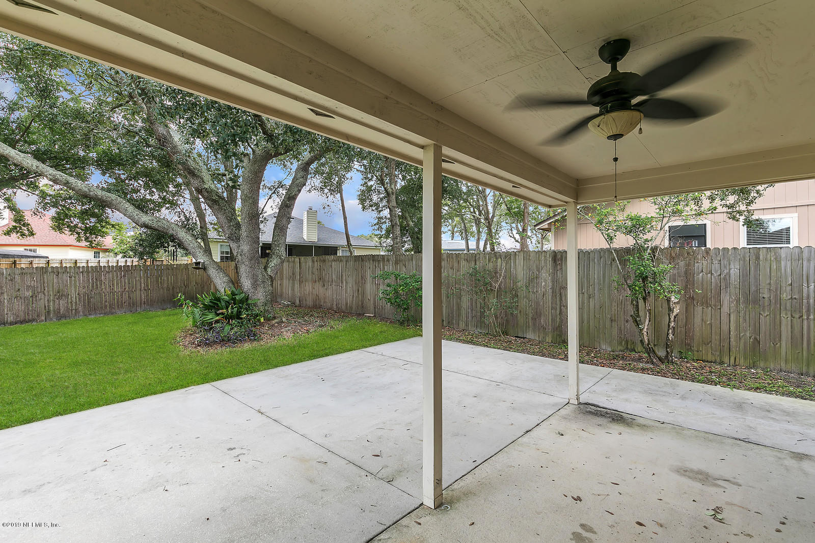 12436 Running River Road South Jacksonville, FL 32225 - Photo 23 of 25 a view of a porch with hardwood