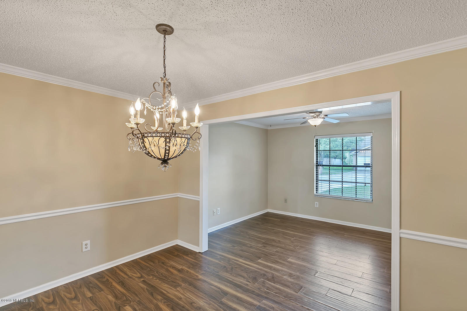 12436 Running River Road South Jacksonville, FL 32225 - Photo 10 of 25 a view of a room with window and wooden floor
