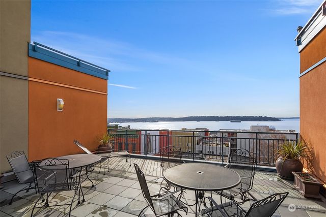 a view of a balcony with city view