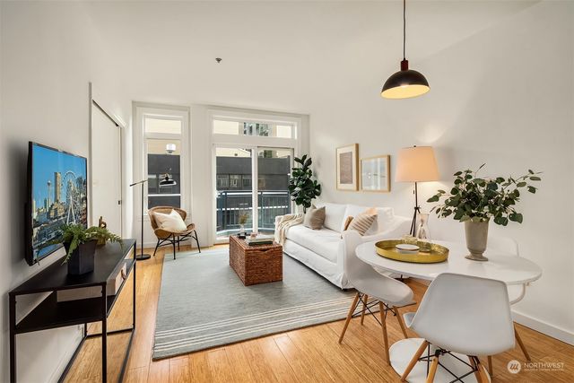 a kitchen with a sink stove and refrigerator
