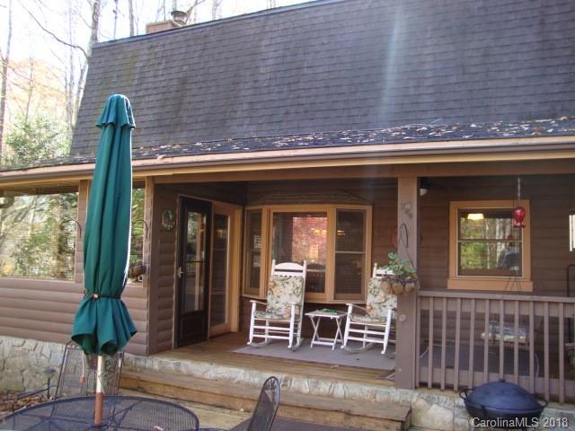 249 Nottingham Road, Unit 10 Maggie Valley, NC 28751 - Photo 2 of 24 a front view of a house with outdoor seating