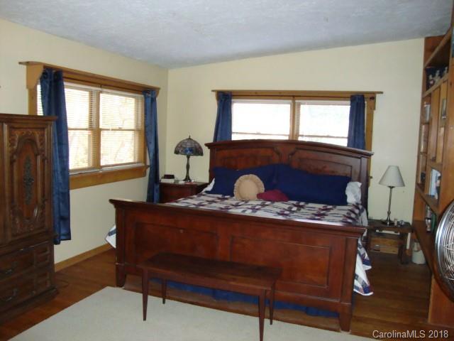 249 Nottingham Road, Unit 10 Maggie Valley, NC 28751 - Photo 18 of 24 a living room with furniture a window and a fireplace