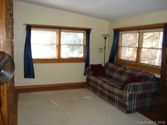 249 Nottingham Road, Unit 10 Maggie Valley, NC 28751 - Photo 19 of 24 a living room with furniture and a window