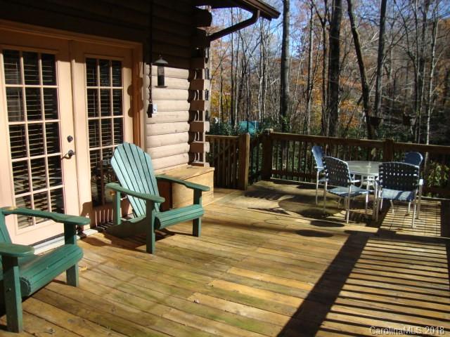 249 Nottingham Road, Unit 10 Maggie Valley, NC 28751 - Photo 21 of 24 a view of a chairs and table in the patio