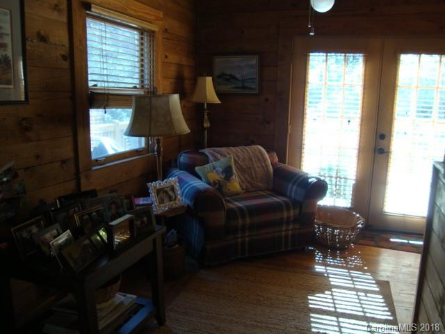 249 Nottingham Road, Unit 10 Maggie Valley, NC 28751 - Photo 5 of 24 a living room with furniture and a window