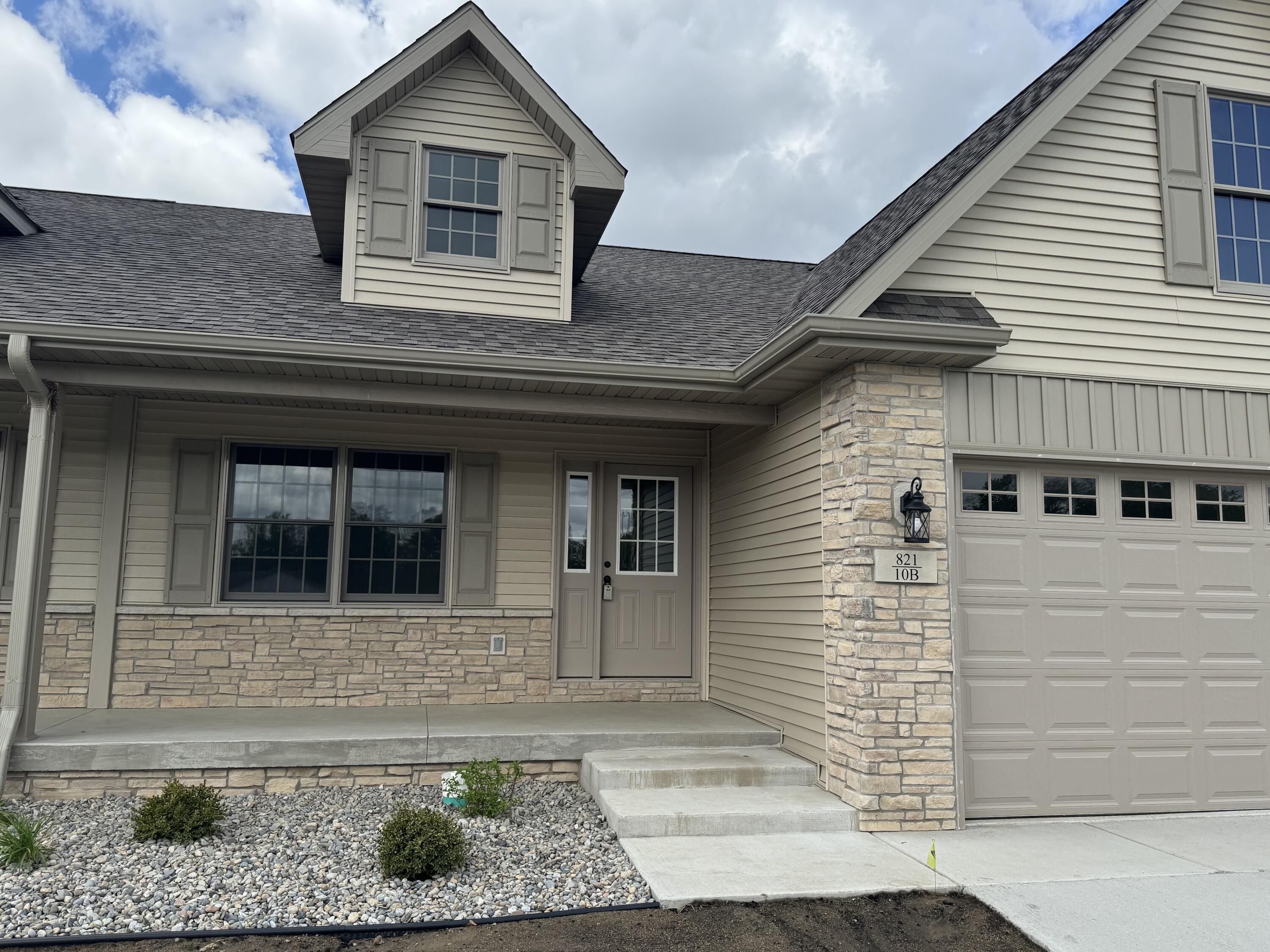 821 9th Street Southwest, Unit 10B De Motte, IN 46310 - Photo 3 of 17 a front view of a house