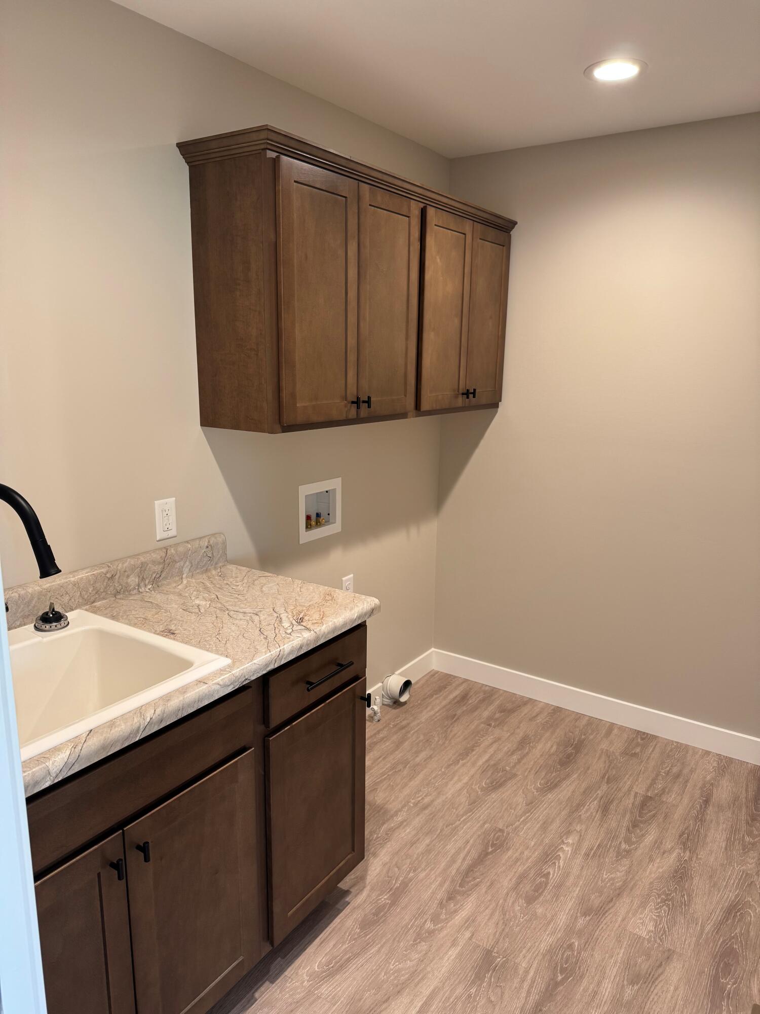821 9th Street Southwest, Unit 10B De Motte, IN 46310 - Photo 5 of 17 a bathroom with a sink and a mirror
