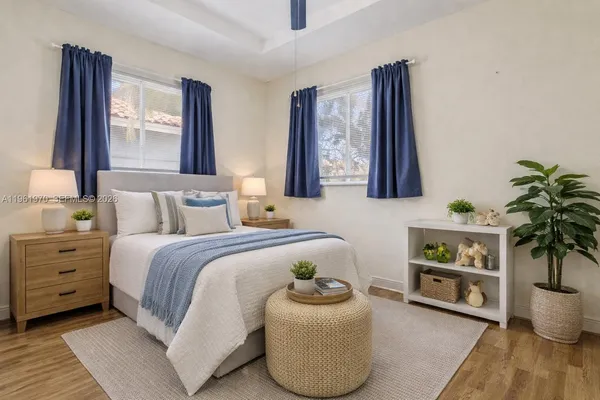 a bathroom with a sink a mirror and vanity