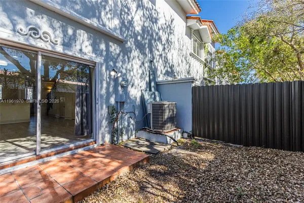 a view of a front door and a window